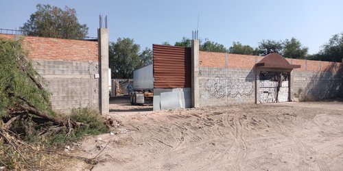 Localizan cajas de tráiler con reporte de robo en un predio