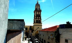Formarán cruz monumental con veladoras en el atrio parroquial