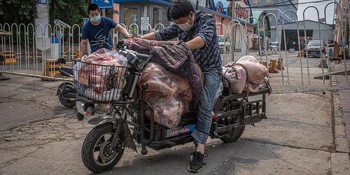 Mayor mercado mayorista de Beijing cierra por nuevos casos de COVID-19