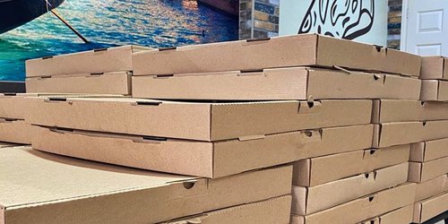 Paisana regala pizza a sus connacionales del Huizachal